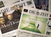 Attac's fake newspaper next to an original edition of the German weekly 'Die Zeit'