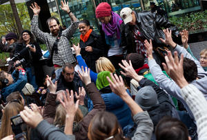 Occupy Wall Street protestors greet speakers during a brief sit-in outside the JP Morgan Chase headquarters on Park Avenue in New York on Friday, Oct. 28, 2011. Nearly 400 Occupy†Wall†Street protesters carried what they said were 7,000 letters of complaint to offices of banks they accuse of corporate greed. 
